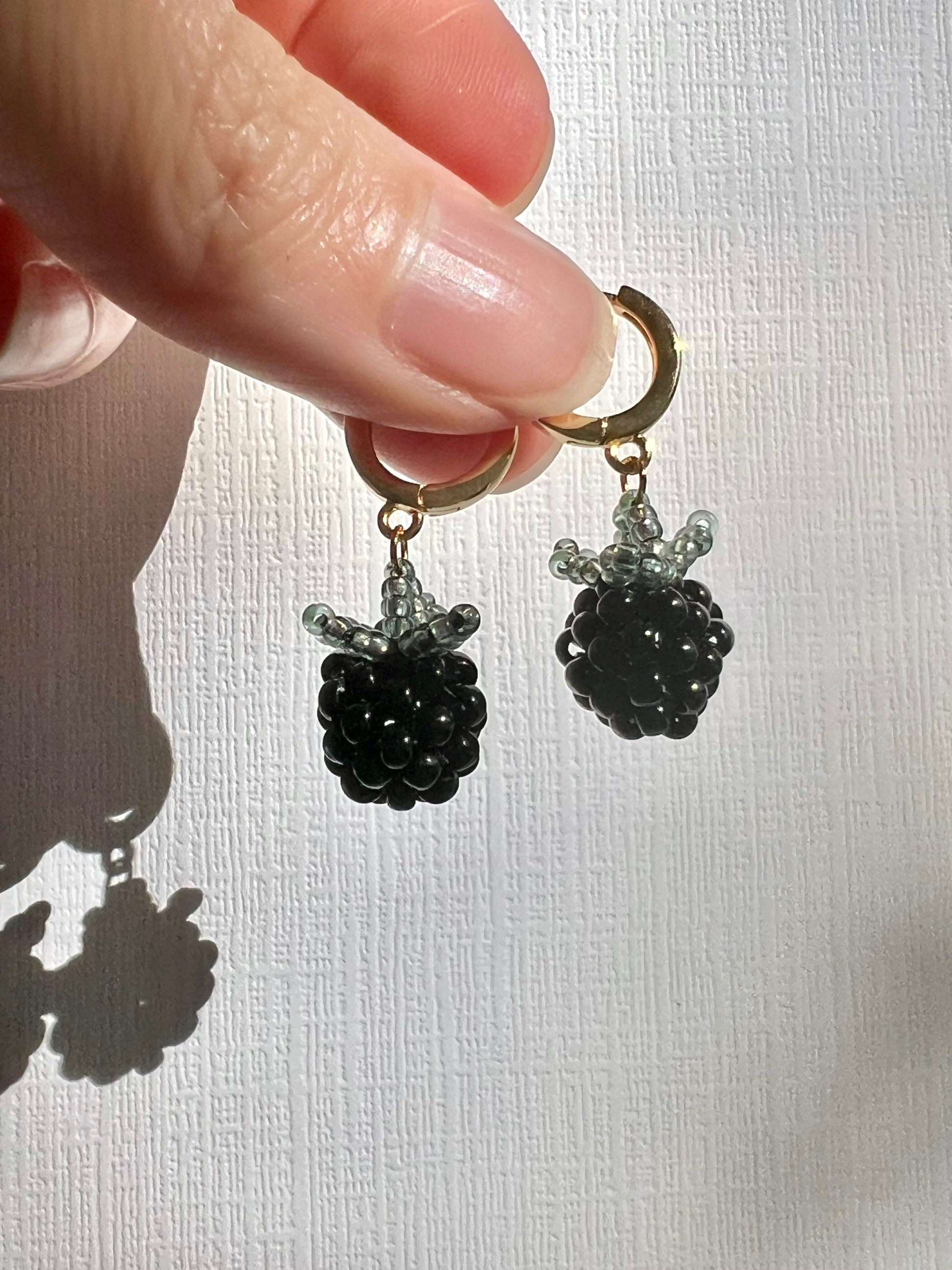 The cutest beaded blackberry earrings with gold filled hoops.